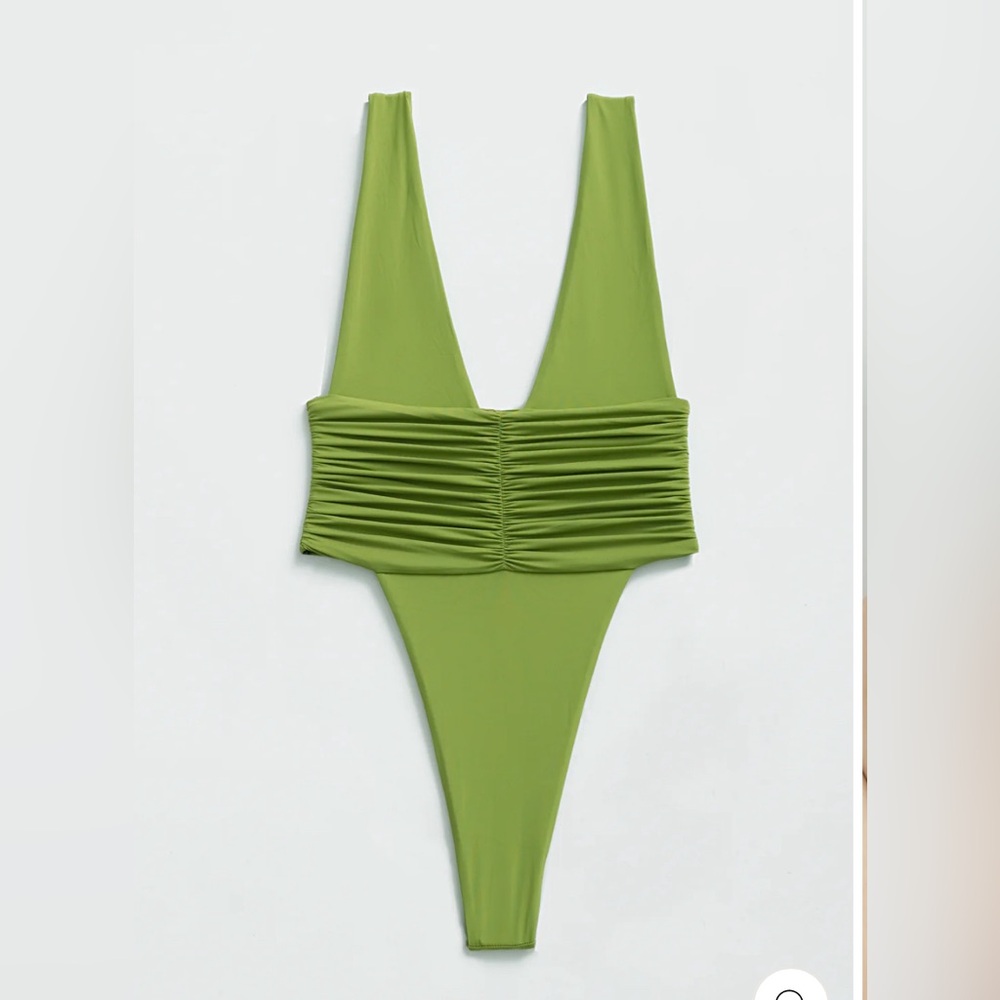 Brand new. Tags attached. Never worn. Riot Swim Matcha Echo One Piece Size Small